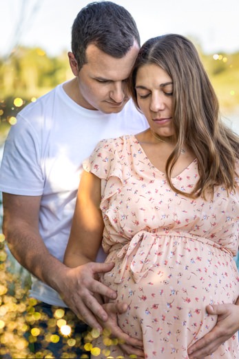 a man and woman standing outside
