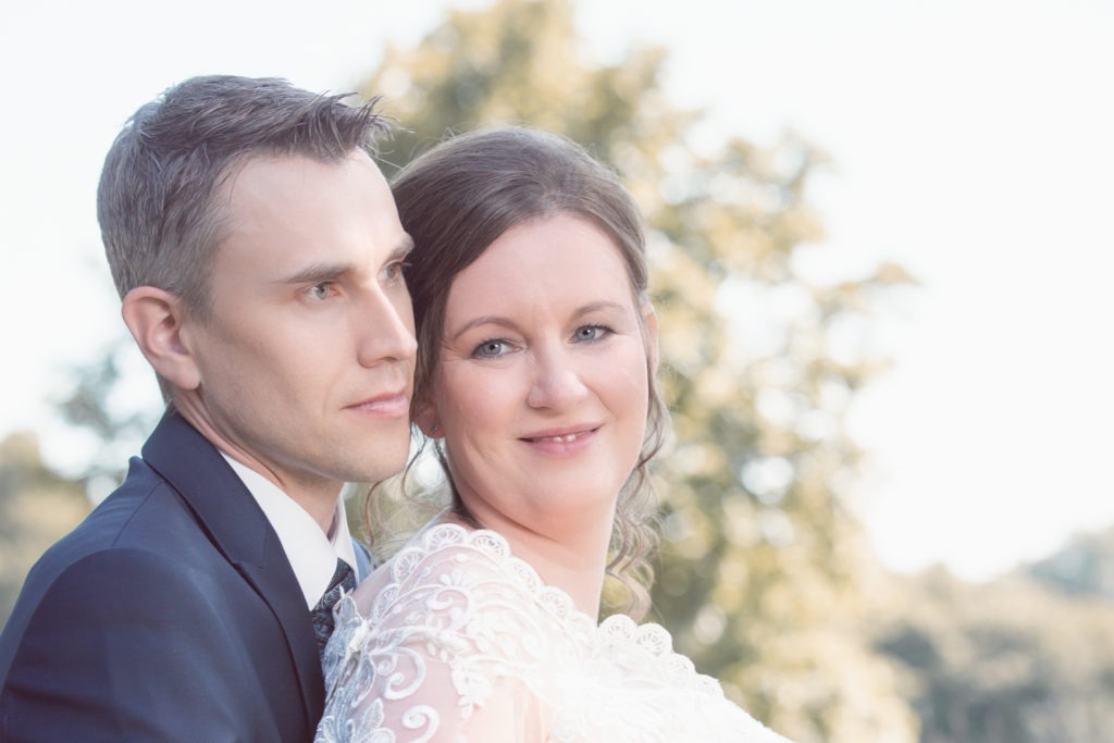 a man and woman posing for a picture